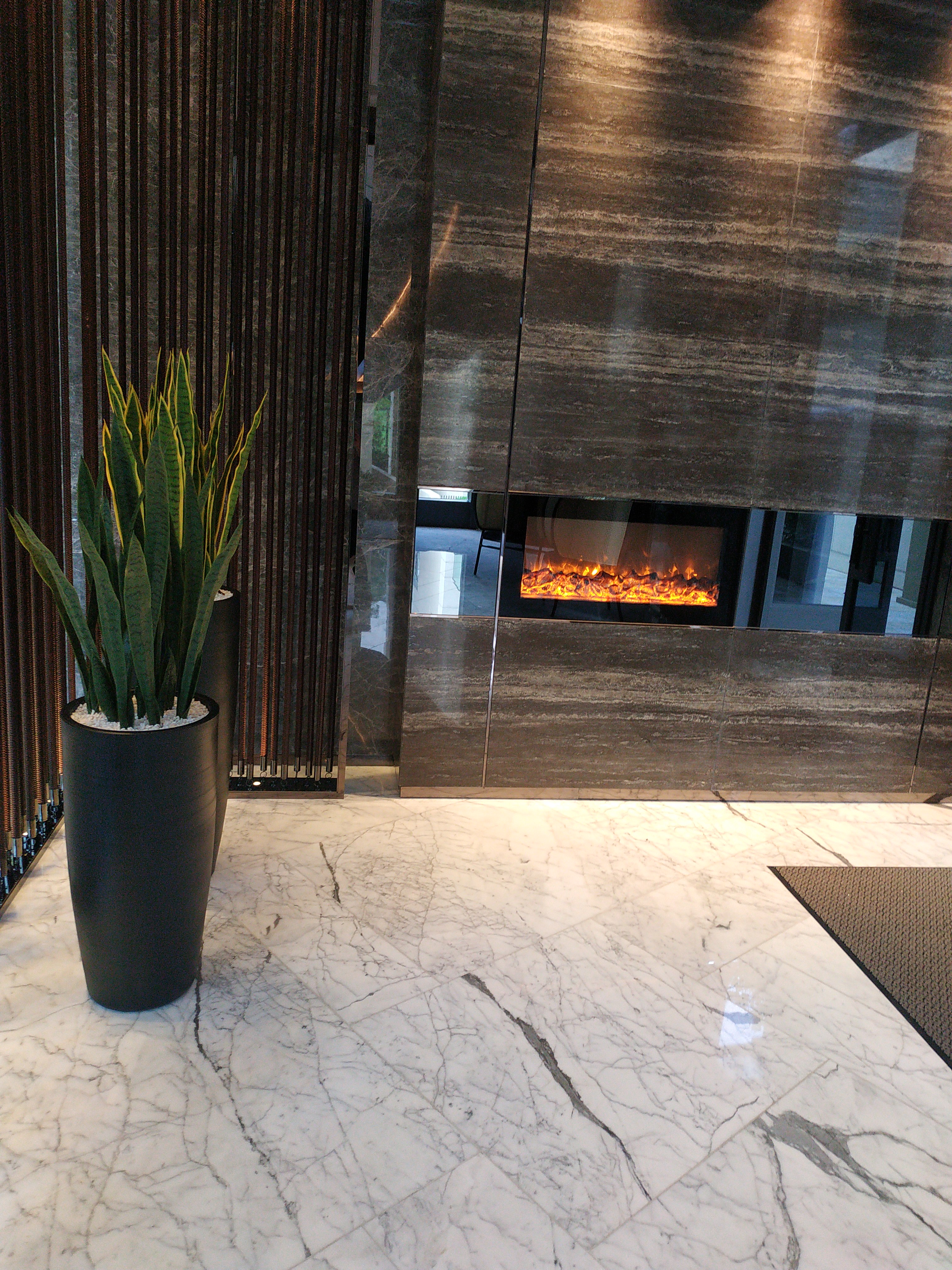 Golf Eden Manor clubhouse electric fireplace · lobby linear flame · BB Fires